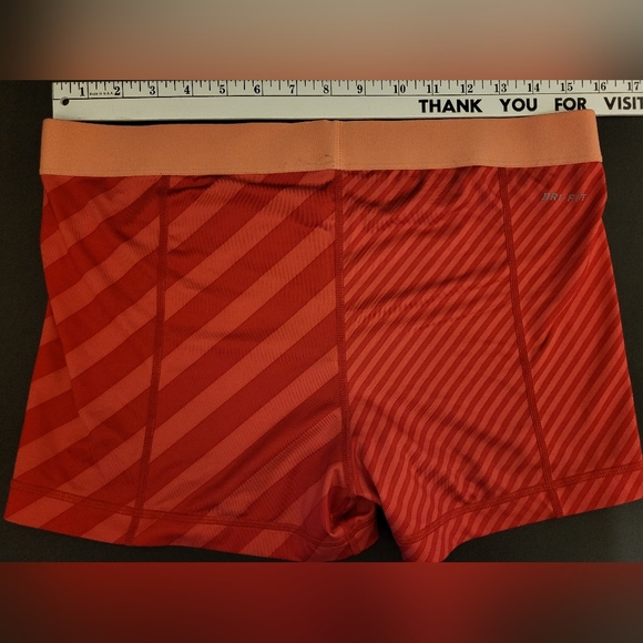 Nike Pro Shorts Size XL Compression Red Stripe Asymmetrical Womens - Picture 2 of 3